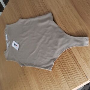 Calvin Klein Thong Bodysuit Taupe Color. NWT